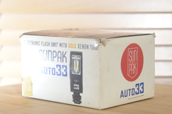 Boxed Sunpak Auto 33 Universal Flash unit. Great Bounce flash unit and surprisingly powerful for its size. - RewindCameras quality vintage cameras, fully tested and serviced