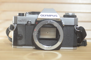 Gorgeous Olympus OM20 35mm SLR camera. Body only. Why not pair it with one of our OM lenses? - RewindCameras quality vintage cameras, fully tested and serviced