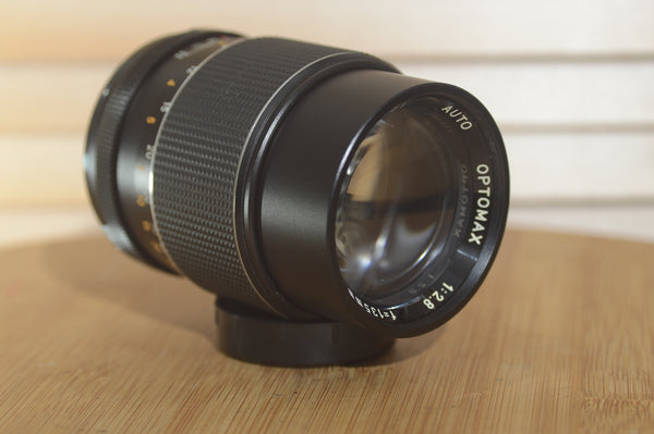 Gorgeous Optimax 135mm f2.8 M42 fit lens. Fantastic lens with clear and crisp optics - RewindCameras quality vintage cameras, fully tested and serviced