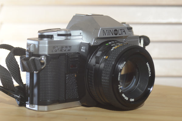 Lovely Minolta X-300 with Minolta 50mm f1.7 lens and case. Fantastic beginner camera - RewindCameras quality vintage cameras, fully tested and serviced