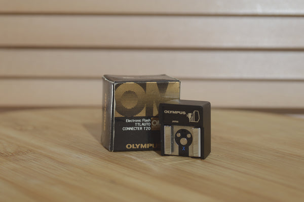 Boxed Olympus Electric Flash TTL Auto Connecter T20.  Perfect size for a pocket in your camera bag. - RewindCameras quality vintage cameras, fully tested and serviced
