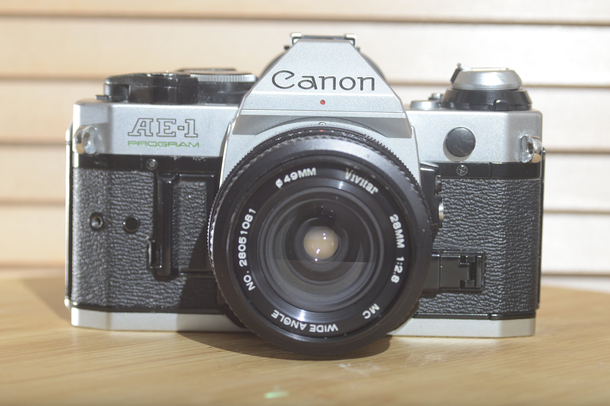 Canon AE1 P with Vivitar Wide Angle 28mm f2.8 FD lens. Beautiful example of a well looked after vintage camera. - RewindCameras quality vintage cameras, fully tested and serviced