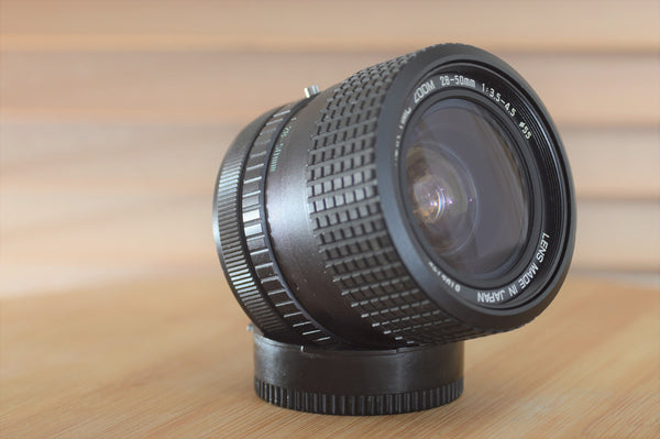 Hoya HMC Zoom FD 28-50mm f3.5-4.5 lens in Hoya Case. Fantastic wide angle lens. - RewindCameras quality vintage cameras, fully tested and serviced