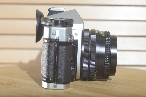 Canon AE1 P with Vivitar Wide Angle 28mm f2.8 FD lens. Beautiful example of a well looked after vintage camera. - RewindCameras quality vintage cameras, fully tested and serviced