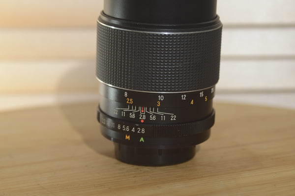 Gorgeous Optimax 135mm f2.8 M42 fit lens. Fantastic lens with clear and crisp optics - RewindCameras quality vintage cameras, fully tested and serviced