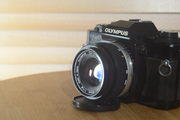 Olympus OM40 Program Starter pack. Comes with 35mm film camera, lens and more - RewindCameras quality vintage cameras, fully tested and serviced