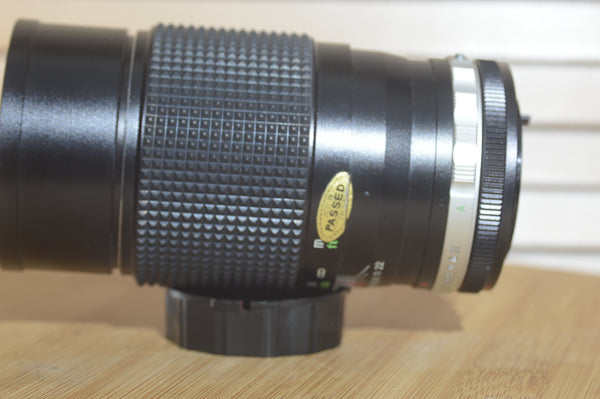 Soligor Auto MC 200mm f3.5 FD lens.  In excellent condition. These are lovely lenses that produce fantastic images - RewindCameras quality vintage cameras, fully tested and serviced