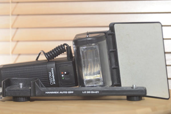 Boxed Hanimex Pro/550 Universal Flash unit. Great Bounce flash unit. - RewindCameras quality vintage cameras, fully tested and serviced