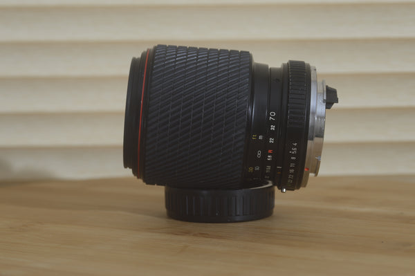 Tokina 70-210mm f4-5.6 Pentax k mount Lens. A fantastic lens for any K mount camera. Clean and sharp optics - RewindCameras quality vintage cameras, fully tested and serviced