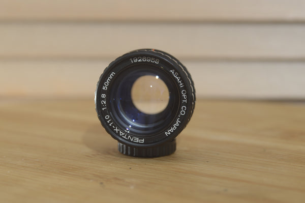 Asahi Pentax 110 50mm f2.8 lens. Gorgeous little lens to add to your Pentax 110 kit. - RewindCameras quality vintage cameras, fully tested and serviced