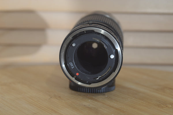 Canon FD 70-150mm f4.5 Zoom Lens. Lovely sharp optics. Fantastic range for portraits with built in hood - RewindCameras quality vintage cameras, fully tested and serviced