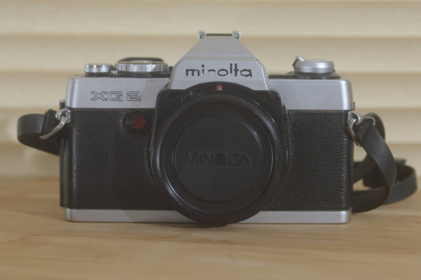Minolta XG2 Film Camera. A great 35mm SLR. Lovely addition to any level of photographer's kit. - RewindCameras quality vintage cameras, fully tested and serviced