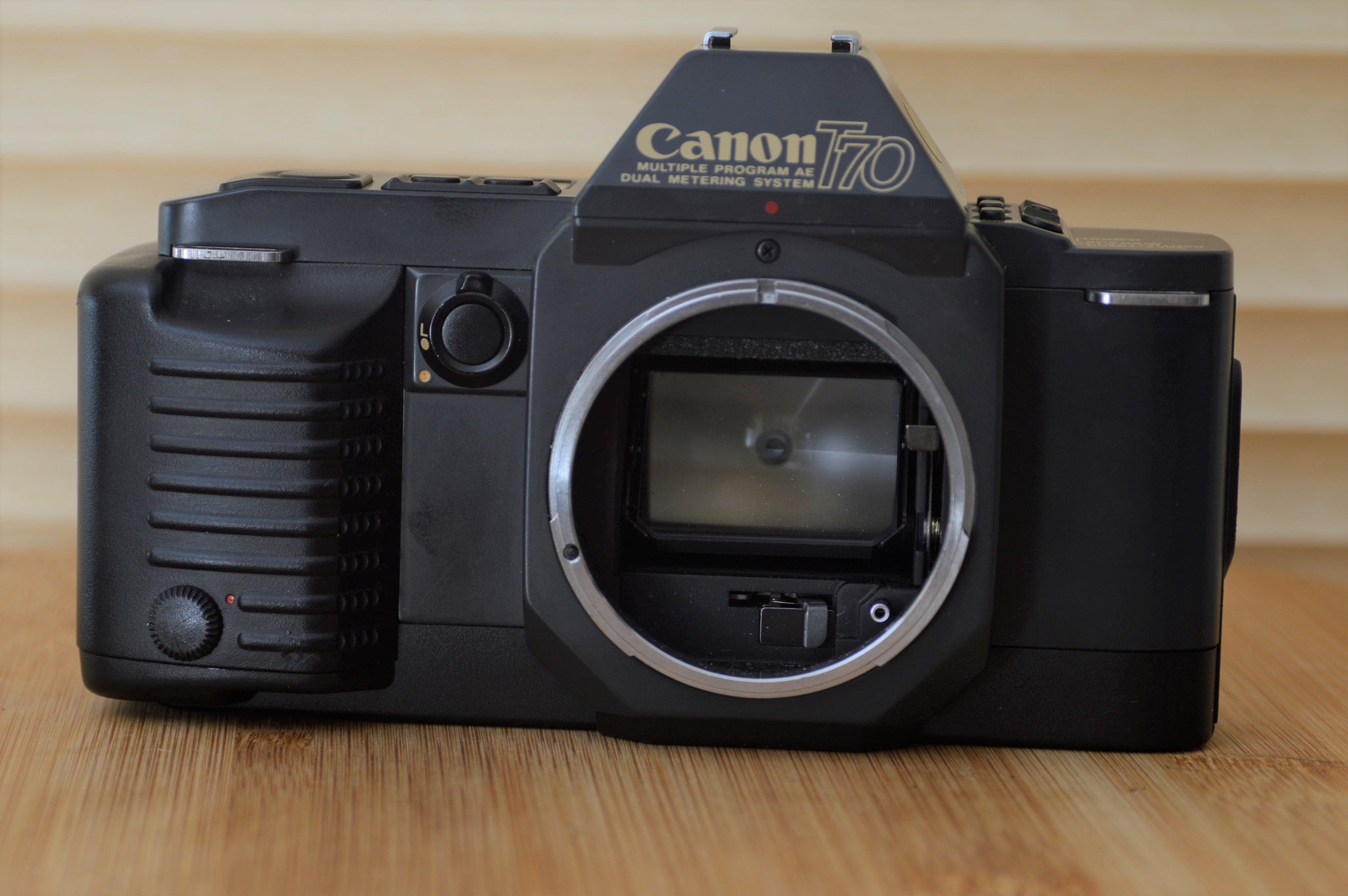 Canon T70 35mm SLR Camera. Near Mint condition, cleaned and tested. feels just like a digital - It couldn't be easier! - RewindCameras quality vintage cameras, fully tested and serviced