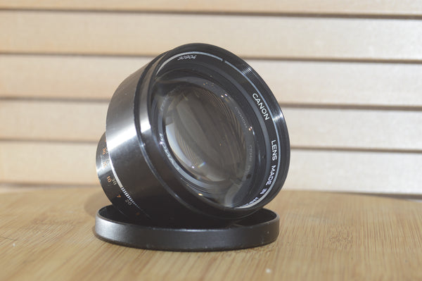 Gorgeous Canon EX 125mm f3.5 lens with case and lens hood. A fantastic addition to any photographers kit. A beautiful piece. - RewindCameras quality vintage cameras, fully tested and serviced