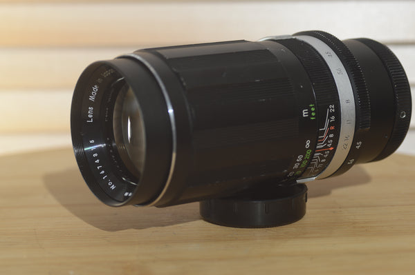 Soligor 200mm f4.5 M42 fit lens.  Excellent Zoom Lens. - RewindCameras quality vintage cameras, fully tested and serviced