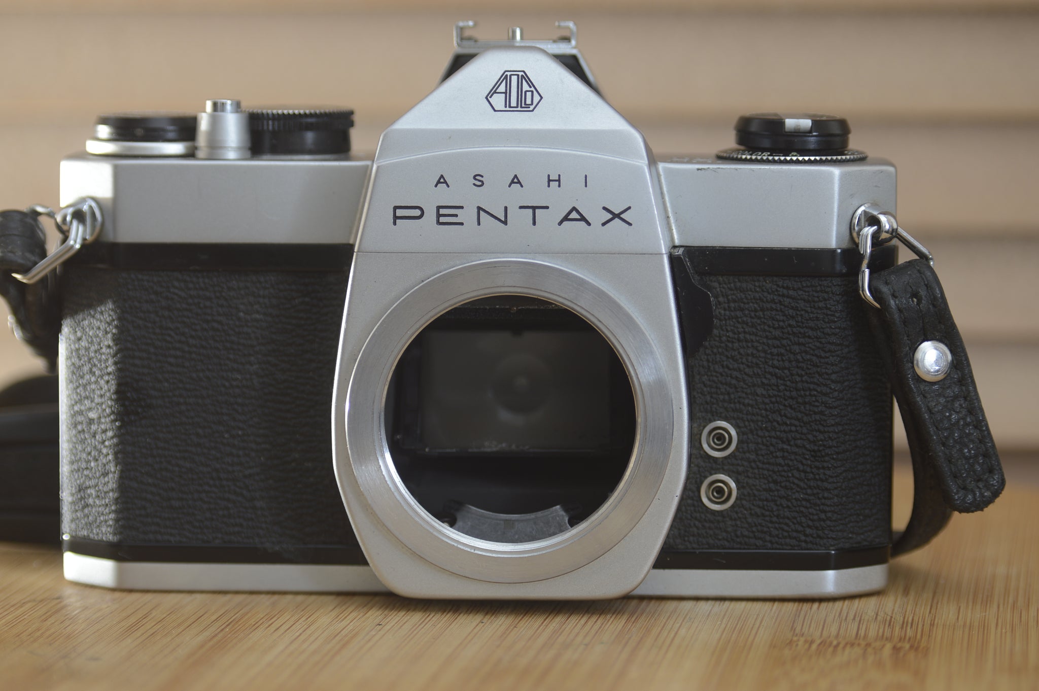 Asahi Spotmatic sp 1000 with strap. In near Mint condition. These are super collectable now, why not add one of our M42 lenses? - RewindCameras quality vintage cameras, fully tested and servi