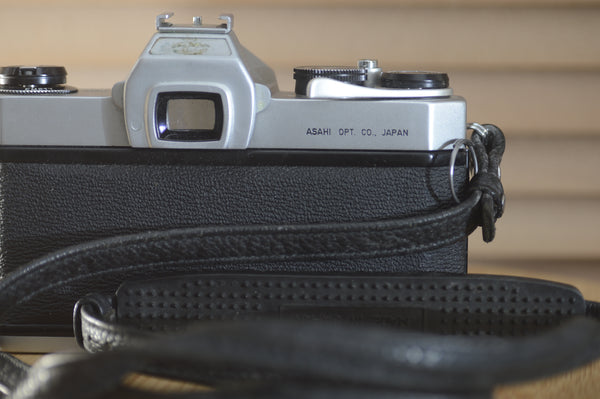 Asahi Spotmatic sp 1000 with strap. In near Mint condition. These are super collectable now, why not add one of our M42 lenses? - RewindCameras quality vintage cameras, fully tested and servi
