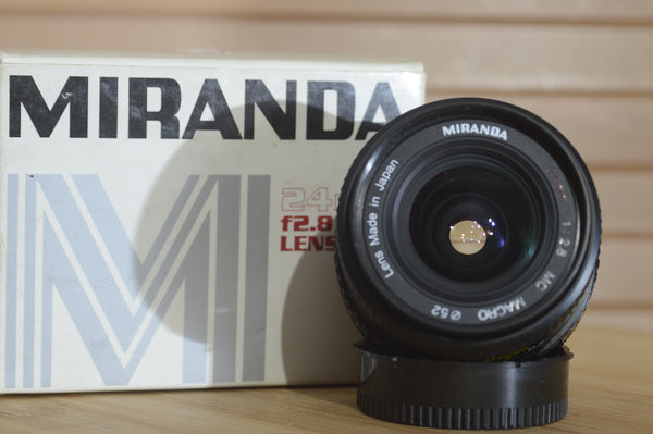 Miranda 24mm f2.8 fast prime FD fit lens in its original box. A rare find. Lovely sharp optics. A great Super wide lens. - RewindCameras quality vintage cameras, fully tested and serviced