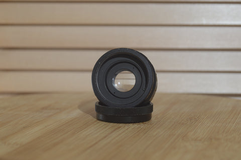 Petri M42 Mount Auto X2 converter with case. Perfect for doubling your focal length. - RewindCameras quality vintage cameras, fully tested and serviced