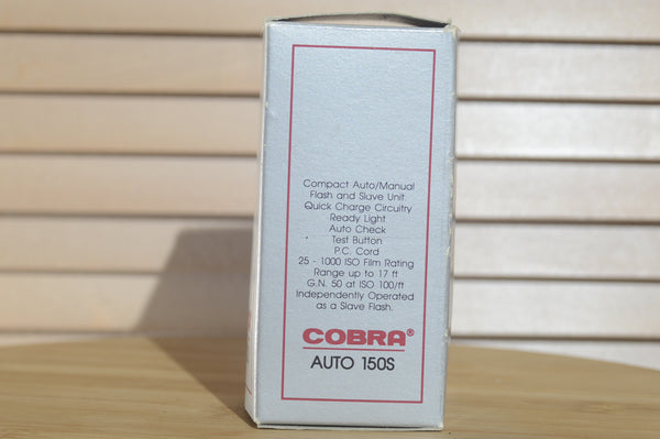 Boxed Cobra Auto 150S Universal Flash Unit. Features include, Slave unit, stand and original instructions - RewindCameras quality vintage cameras, fully tested and serviced