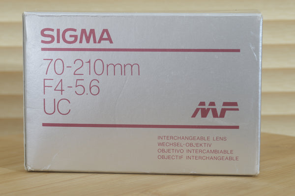 Boxed Sigma MF 70-210mm f4-5.6 UC Zoom Minolta lens. A lovely condition lens with great range. A wonderful addition to your vintage set up. - RewindCameras quality vintage cameras, fully test
