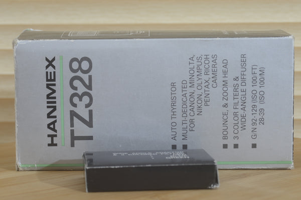 Boxed Hanimex TZ328 flash unit, multi dedicated tilt and defuse settings.  With auto auto mode and manual settings. - RewindCameras quality vintage cameras, fully tested and serviced