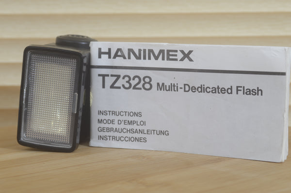 Boxed Hanimex TZ328 flash unit, multi dedicated tilt and defuse settings.  With auto auto mode and manual settings. - RewindCameras quality vintage cameras, fully tested and serviced