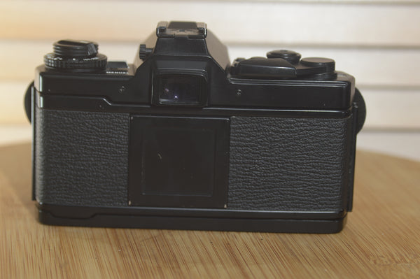 Boxed Black Olympus OM4 SLR Camera Body. In Fantastic condition. Comes with original packaging and Manuals - RewindCameras quality vintage cameras, fully tested and serviced