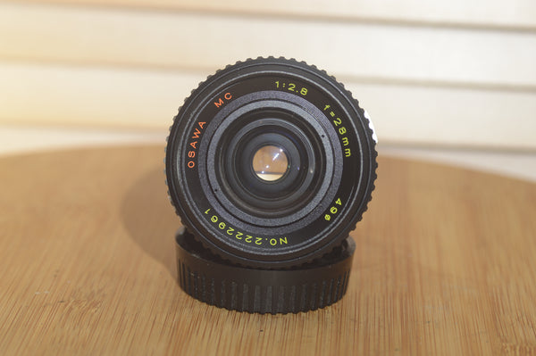 Fab Osawa 28mm f2.8 OM Lens. A perfect addition to your vintage Olympus set up. - RewindCameras quality vintage cameras, fully tested and serviced