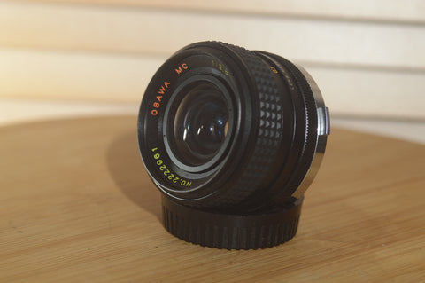 Fab Osawa 28mm f2.8 OM Lens. A perfect addition to your vintage Olympus set up. - RewindCameras quality vintage cameras, fully tested and serviced