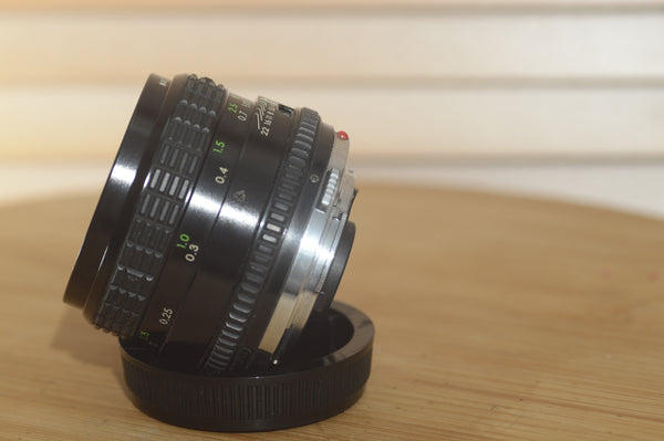 Sigma OM 28mm f2.8 Mini Wide lens. This is a lovely wide angle lens in superb condition! - RewindCameras quality vintage cameras, fully tested and serviced