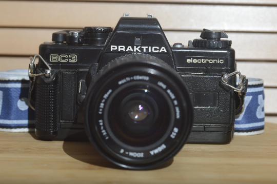 Praktica BC3 Electronic with Sigma 28-70mm f3.5-4.5 lens and strap. Fantastic set up. - RewindCameras quality vintage cameras, fully tested and serviced