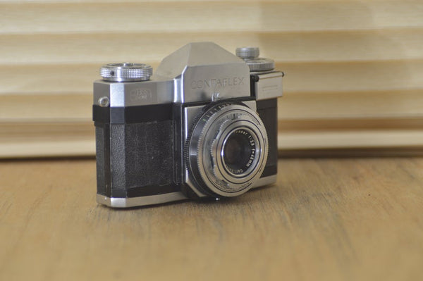 Gorgeous Contaflex Zeiss Ikon 35mm SLR camera. A step back in time, what a fantastic 50's camera! Great as a prop or as a collectors item. - RewindCameras quality vintage cameras, fully teste