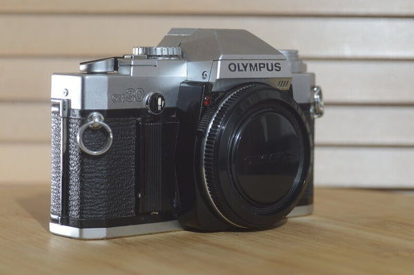 Charming Boxed Olympus OM30 35mm Camera. - RewindCameras quality vintage cameras, fully tested and serviced