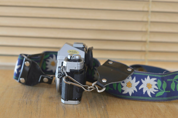 Beautiful Canon AE1 Body only with quirky flower strap the true design classic form Canon, now very collectable and you can see why ! - RewindCameras quality vintage cameras, fully tested and
