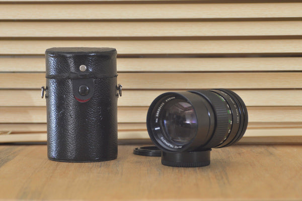 Super Sharp Vivitar FD 135mm 2.8 lens with Leather case.  This is a beautiful lens especially for portraiture work. A stunning bit of glass! - RewindCameras quality vintage cameras, fully tes