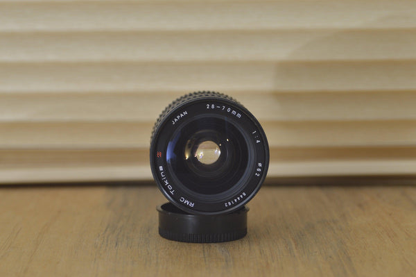Lovely Tokina 28-70mm f4 Pentax k mount Lens. A sharp lens for portraiture through to wildlife photography. Clean and sharp optics - RewindCameras quality vintage cameras, fully tested and se