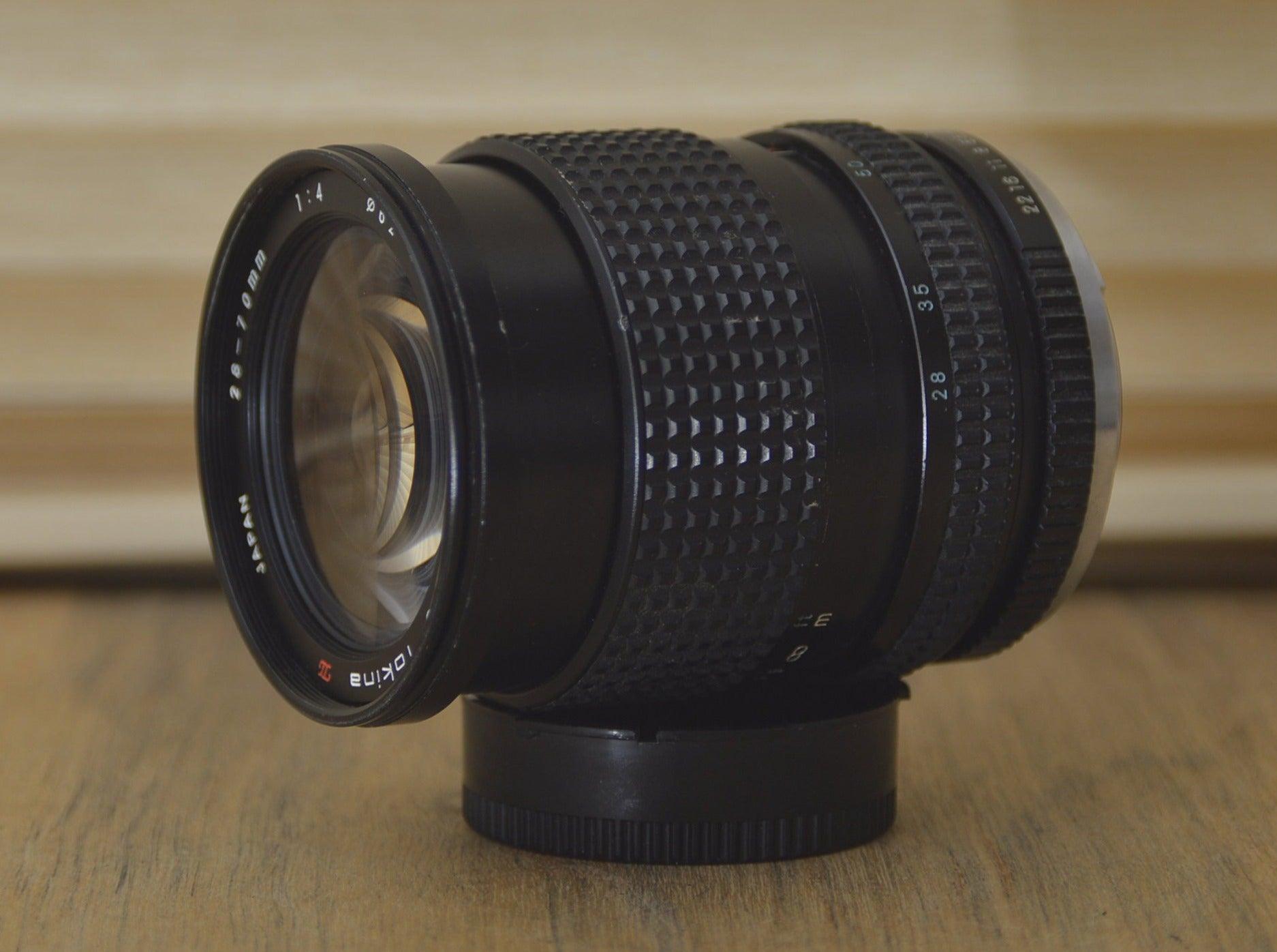 Lovely Tokina 28-70mm f4 Pentax k mount Lens. A sharp lens for portraiture through to wildlife photography. Clean and sharp optics - RewindCameras quality vintage cameras, fully tested and se
