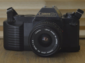 Beautiful Canon T50 camera with 28mm 2.8 FD lens. In lovely condition, feels just like a digital It couldn't be easier to get into 35mm film - RewindCameras quality vintage cameras, fully tes