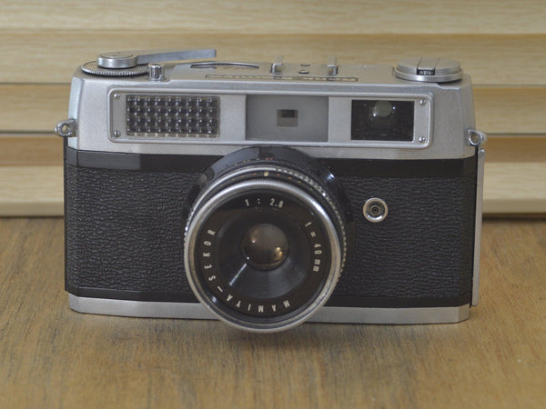 Gorgeous Mamiya Rank rangefinder. In excellent condition and working. Stunning optics a real rare find! Comes with case. - RewindCameras quality vintage cameras, fully tested and serviced