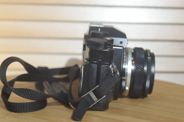 Rare Black Olympus OMPC SLR with Zuiko 50mm f1.8 lens. In Fantastic condition - RewindCameras quality vintage cameras, fully tested and serviced