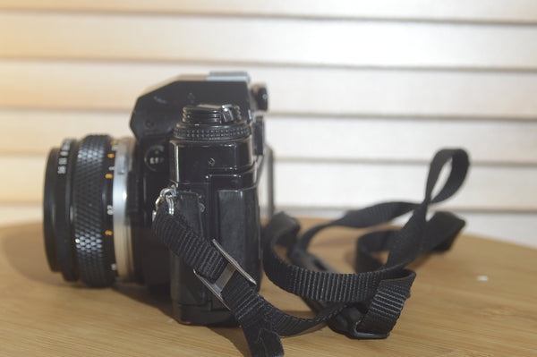 Rare Black Olympus OMPC SLR with Zuiko 50mm f1.8 lens. In Fantastic condition - RewindCameras quality vintage cameras, fully tested and serviced