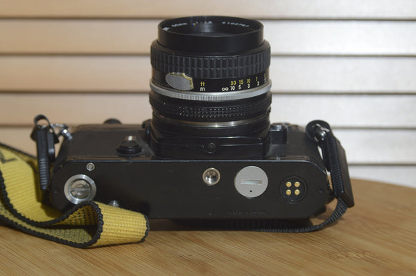 Nikon Black FE With Nikkor 50mm f1.8 Lens Starter Pack. Comes with Lens, Strap and More - RewindCameras quality vintage cameras, fully tested and serviced