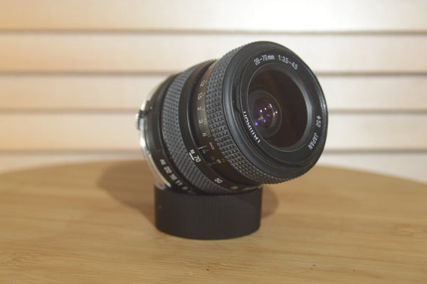 Stunning Tamron OM fit 28-70mm f3.5-4.5 lens. Excellent for street photography. - RewindCameras quality vintage cameras, fully tested and serviced