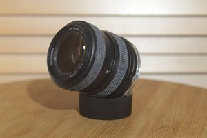 Stunning Tamron OM fit 28-70mm f3.5-4.5 lens. Excellent for street photography. - RewindCameras quality vintage cameras, fully tested and serviced